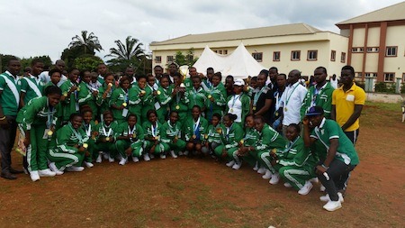 UNN Female Hockey Team pose with Gold Trophy