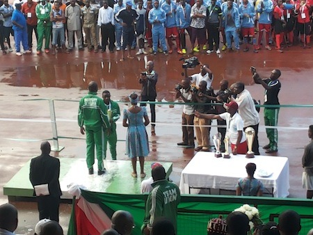UNN male football Team Captain receiving the Bronze trophy from VC Prof Ozumba